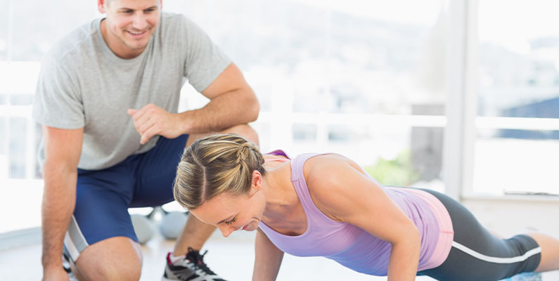 physical therapist working with patient