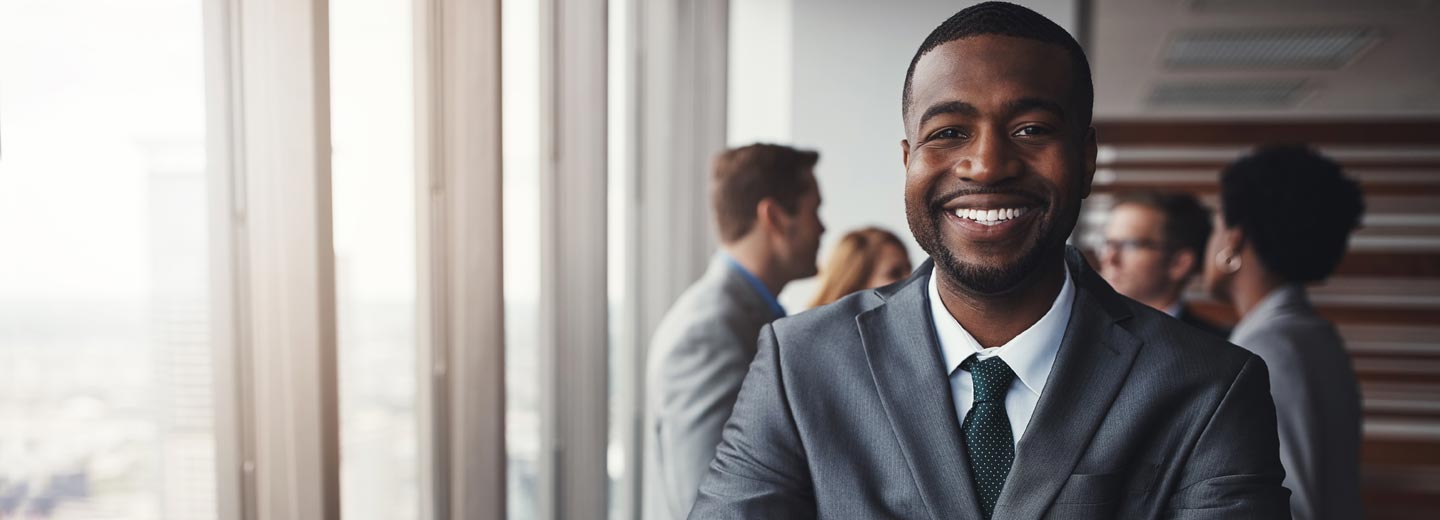 businessman smiling in office