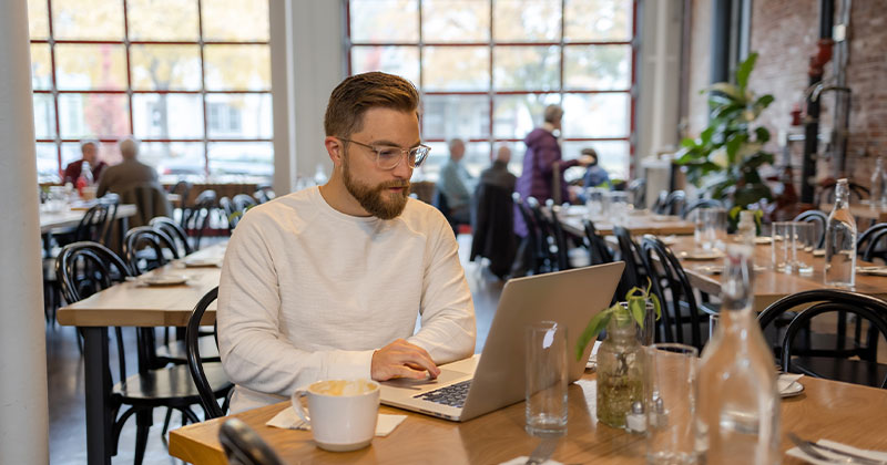 man working in busy restaurant